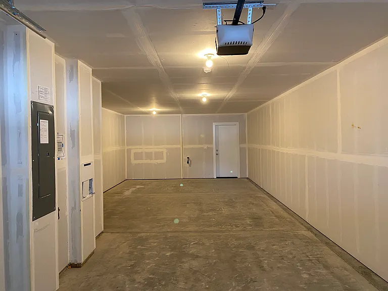 2 car tandem garage, with access to mini backyard.