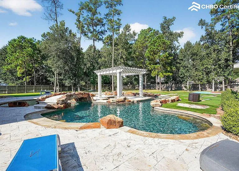 Resort-style lazy river pool with hot tub