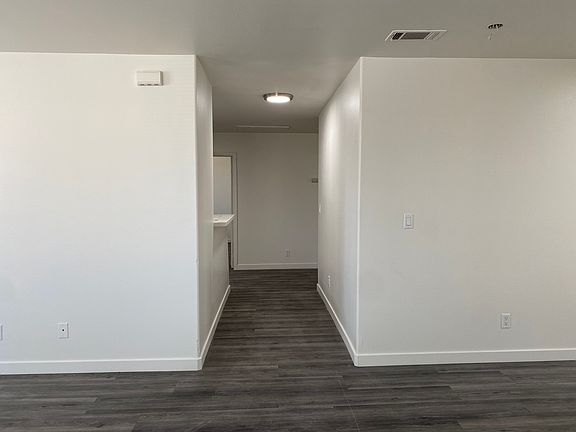 Living room hallway into the kitchen and bedrooms
