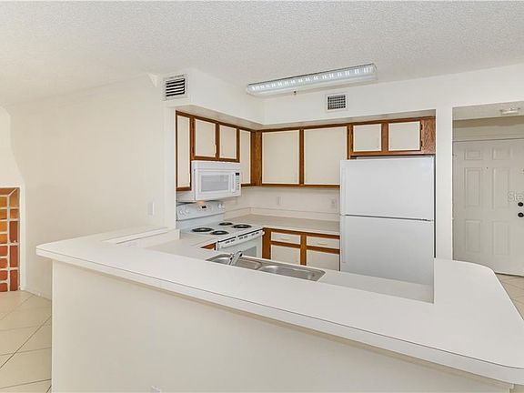 4th image of 2400 Feather Sound Dr APT 1131