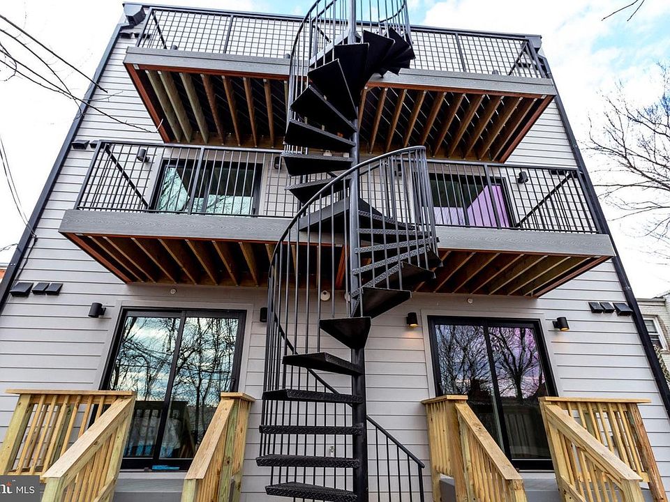 Rear exterior with balconies and stairs