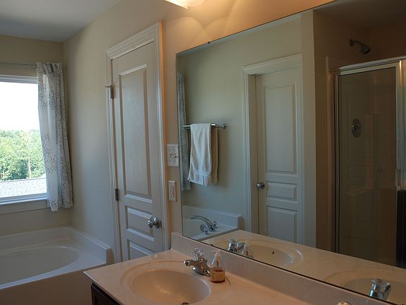 Master bath with separate tub and shower