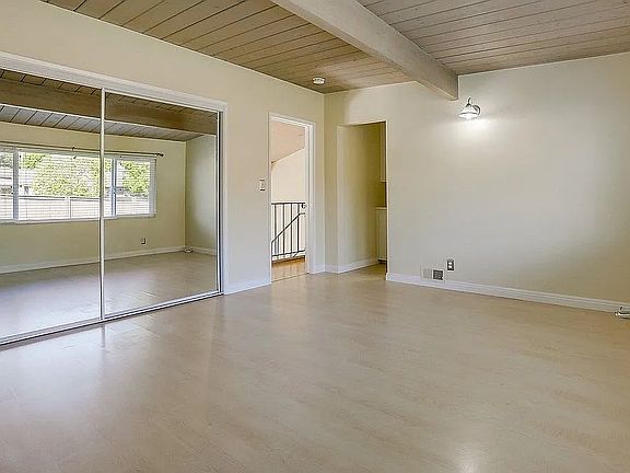 Entire second floor dedicated to a spacious, fully enclosed bedroom retreat with private ensuite bath _ loft-inspired layout with added privacy. Features a full-length mirrored sliding closet and bright, indirect natural light."