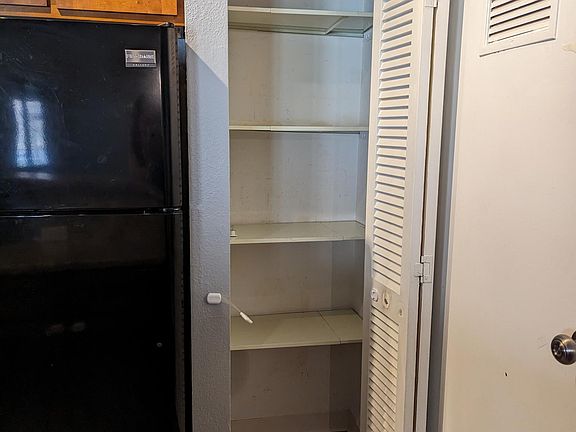 A full height pantry adds to already-spacious storage!