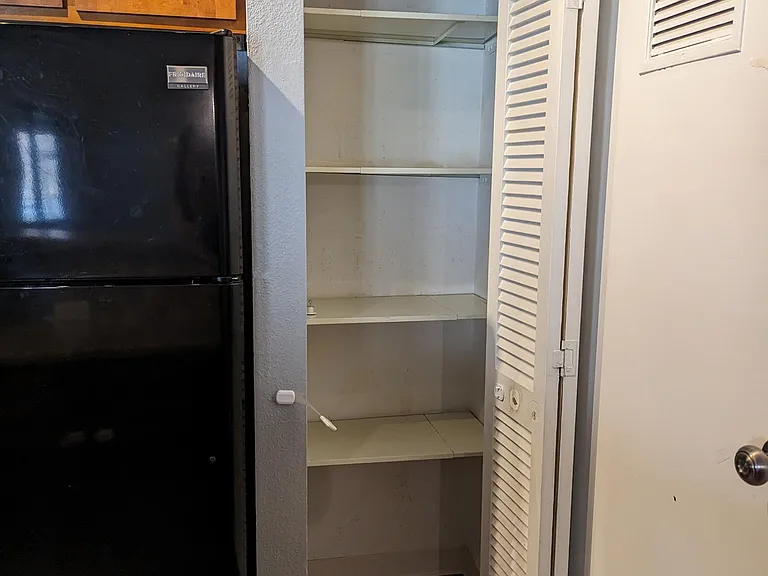A full height pantry adds to already-spacious storage!
