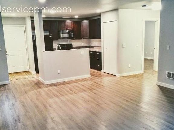 living room looking at kitchen cordes 8426 delridge unit b_01262018