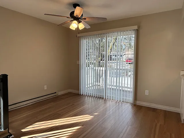 Dining room off kitchen w ceiling fan/ light and access to deck - 2394 W Fairway Dr