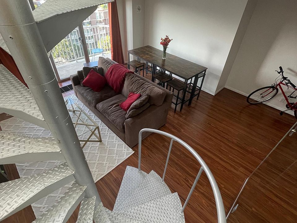 Entering Living Room by Spiral Staircase from Roof Garden
