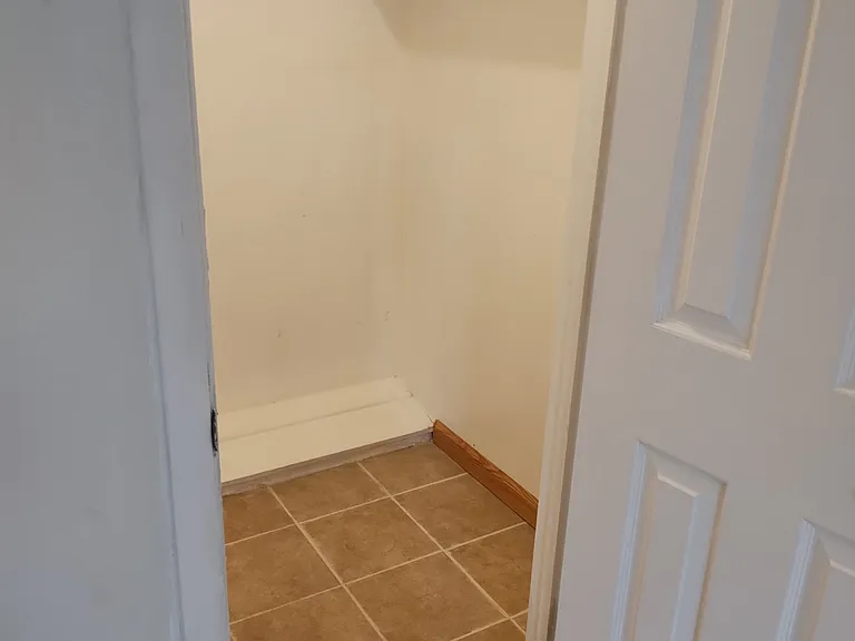 Right side of Middle Bedroom closet.