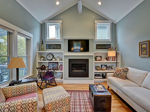 Living Room with built-ins and customizable fireplace.