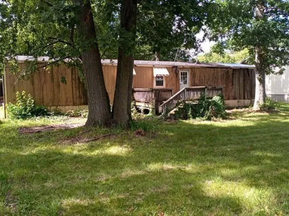 6898 Rowley Dr, Osseo, MI 49266