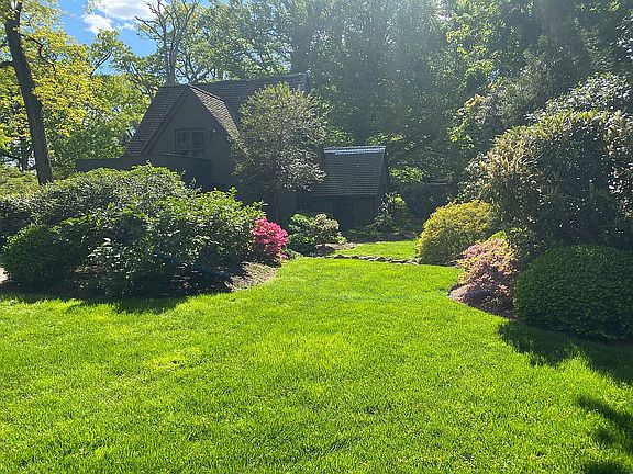 Expansive yard and gardens.