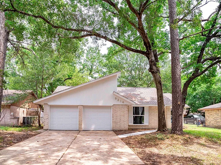 9214 Woodland Oaks Dr — Photo 6