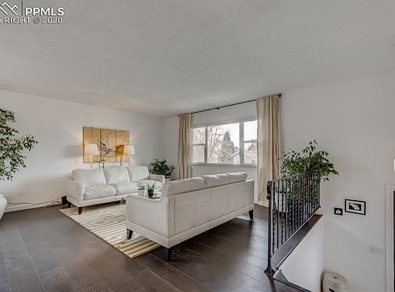 Huge window and gleaming floors. Natural bright light comes with this home!