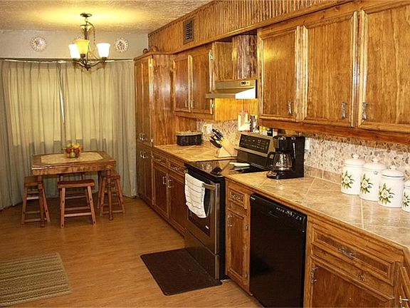 Custom cabinets, countertops, backsplash and under counter lighting