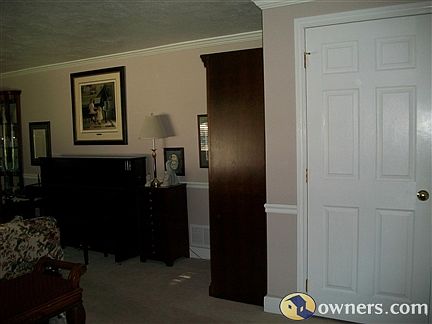 Large coat/utility closet living room