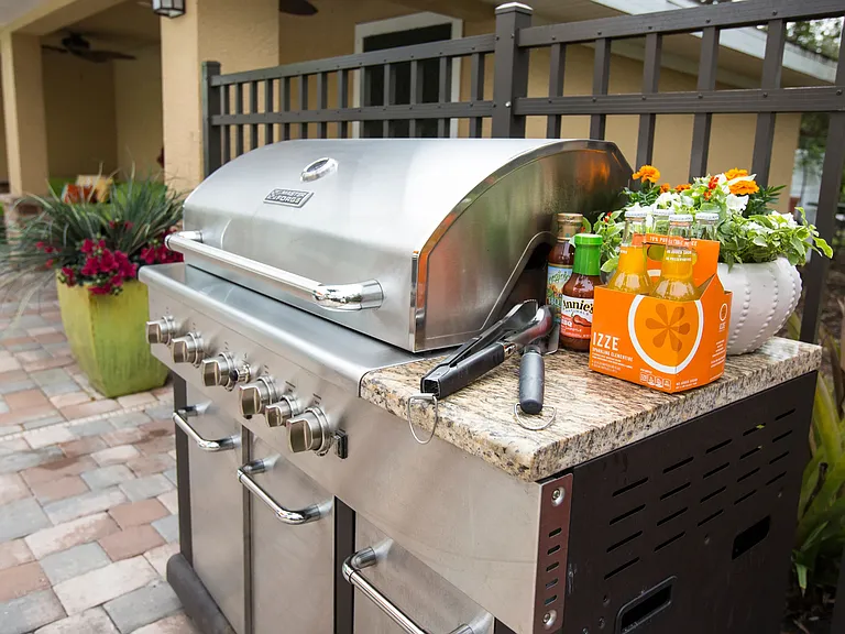 Dive into the ultimate poolside experience with our convenient gas grill station, perfect for hosting vibrant cookouts by the pool.