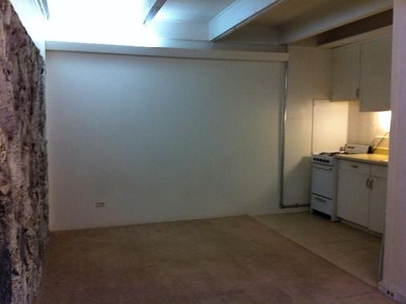 Galley kitchen with gas stove