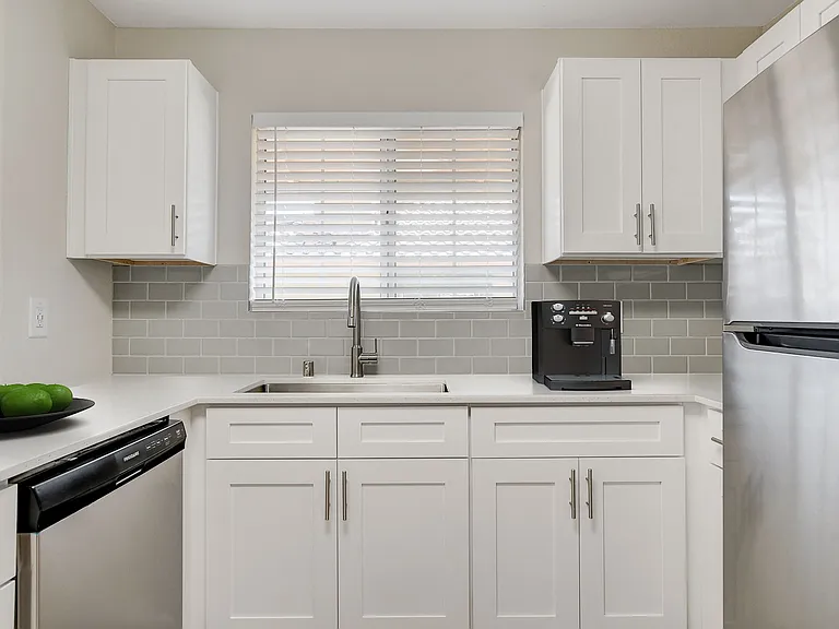 Welcome to Invitational, where modern design meets comfort. Our spacious kitchens feature sleek cabinetry and ample natural light, perfect for culinary creations. Elevate your lifestyle today. Schedule a tour to see your future home!