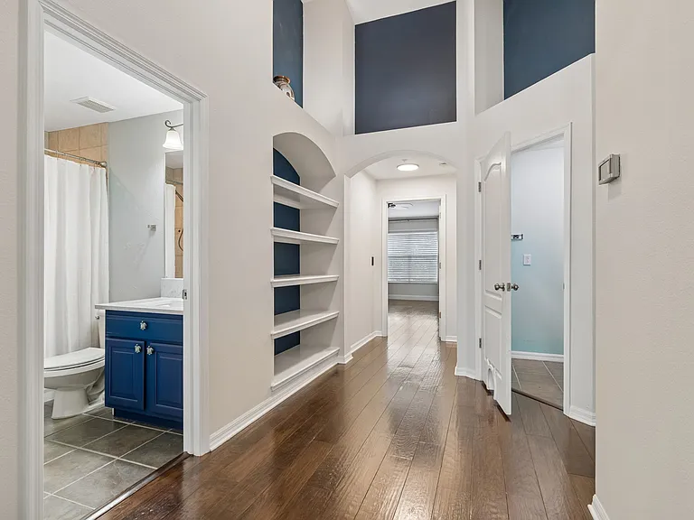 Hallway with timeless customized shelves