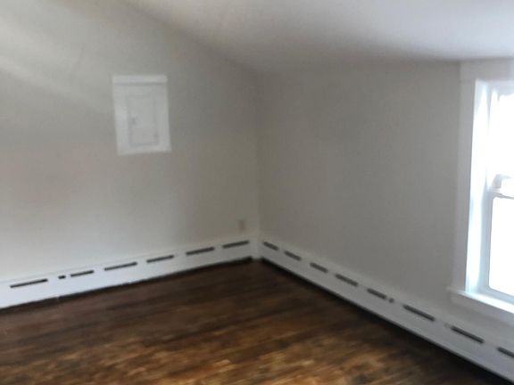 Hardwood floors throughout, freshly painted.