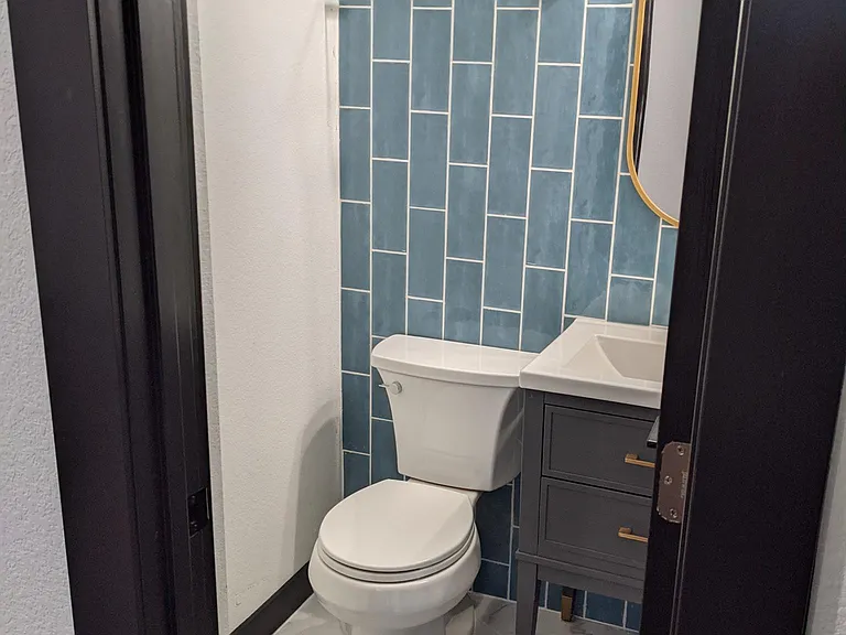 1/2 bath by the living area.