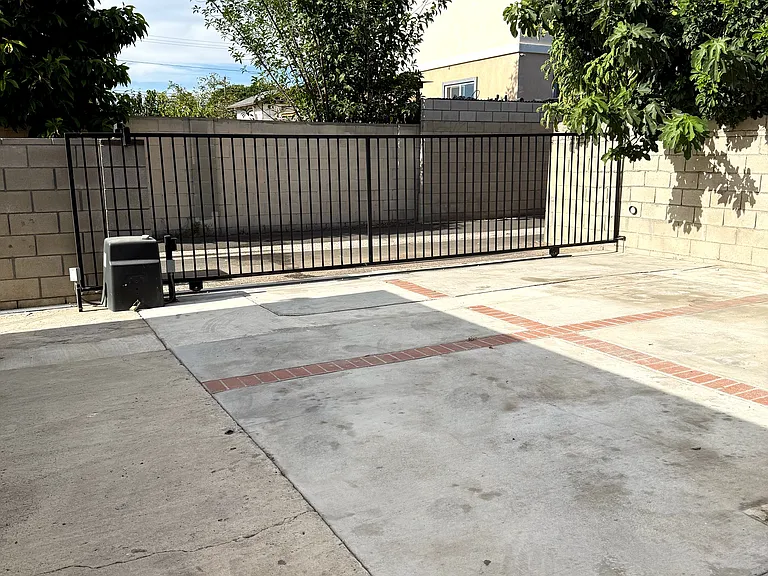 Parking spaces with automatic gate