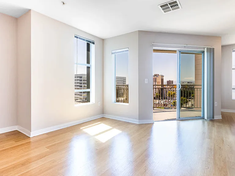 Living Room with Balcony and Hard Surface Flooring