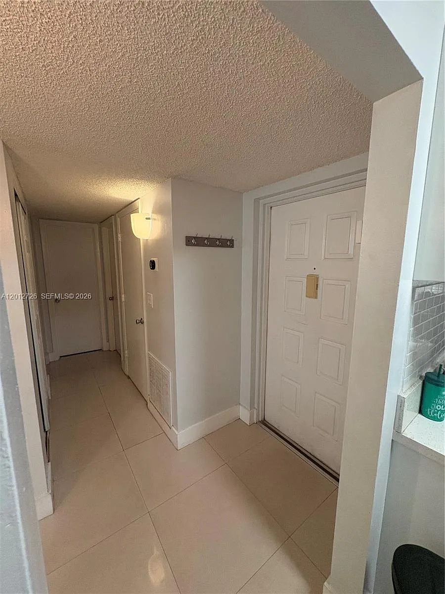 Building Photo - 9531 Seagrape Dr #106