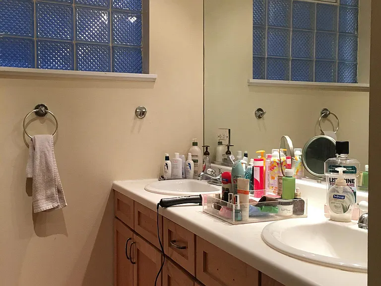 Master BR with Double Sinks and wall-to-wall mirror