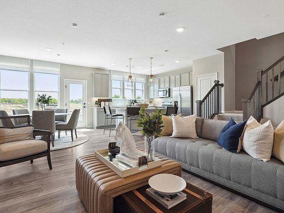 Gazing into the dining room, which flows effortlessly from the gathering room to the kitchen.