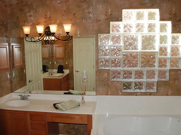 Master bath with double sinks,separate shower and toilet clo