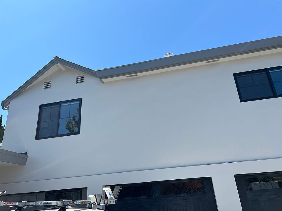 The unit is the whole upper area above the three garages.
