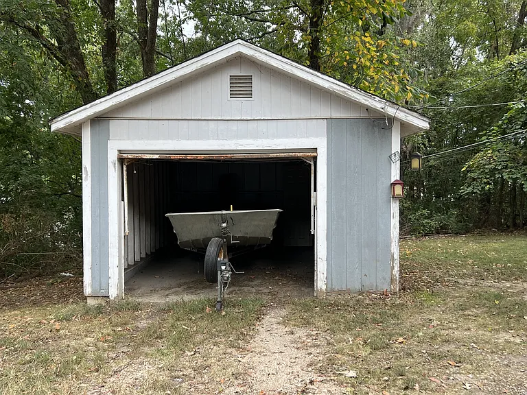 Detatched garage. Boat will be removed