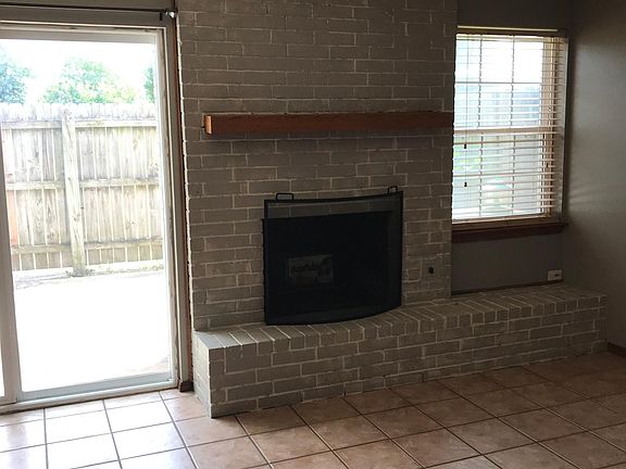 Living room and back patio.