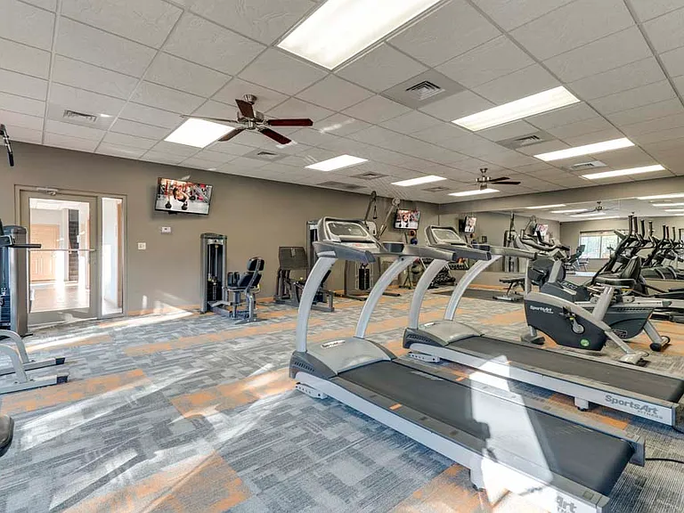 Our 24-hour fitness center offers a large workout space with free weights, cardio equipment and weightlifting machines.