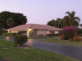 409 S Country Club Dr, Atlantis, FL 33462