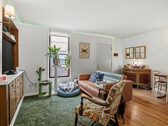 Wood floors, built in cabinets, fresh paint, lots of natural light