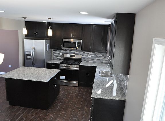 4th image of 8346 Leclaire Ave