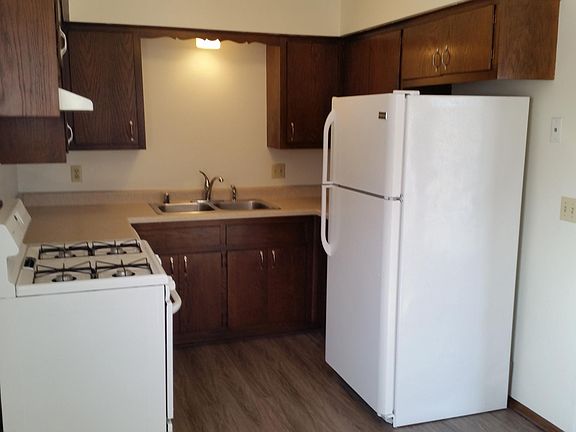 Kitchen with new countertop and laminate flooring