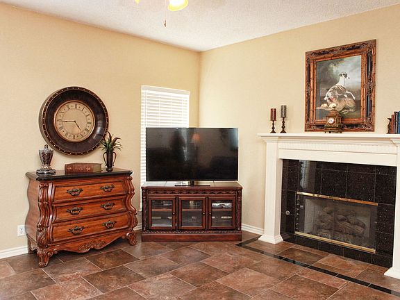 Lovely Living Room with gas log fireplace and new paint