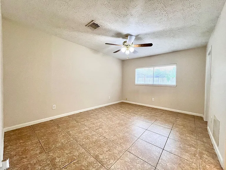 The spacious primary bedroom with a walk-in closet.