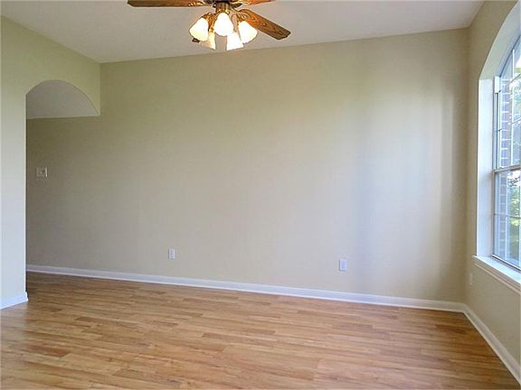 Formal dining with handy access to kitchen.