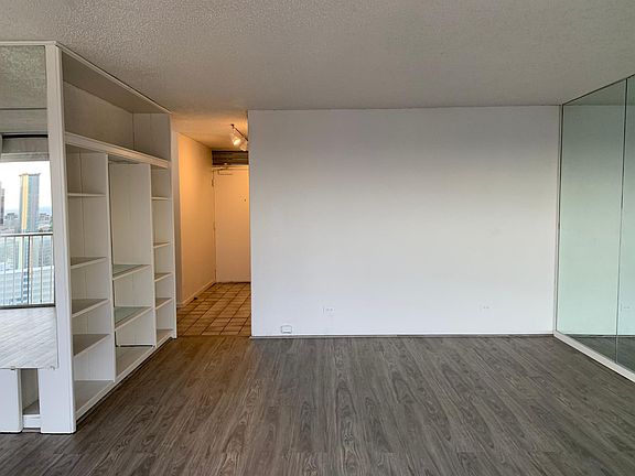 Roomy Living Space with Built-In Bookcase