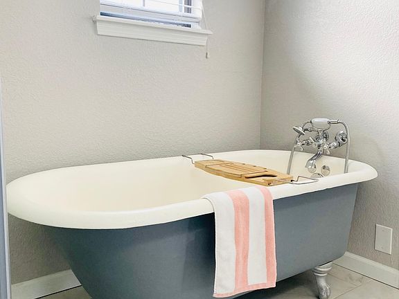 Soak your troubles away in the master bathroom clawfoot tub!