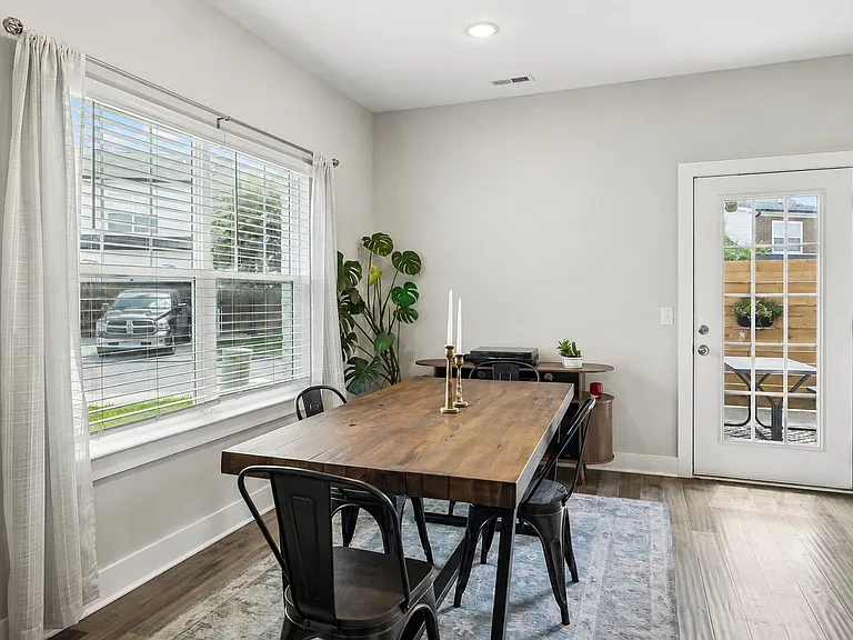 Dedicated dining area with backyard access and plenty of natural light.