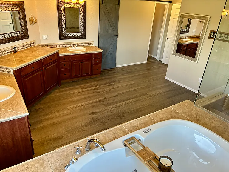 Master Bathroom with Walk-in Closet, Sliding Barn Door and new Luxury Vinyl Plank Flooring