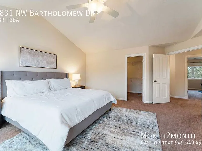 9831 NW Bartholomew Dr — Photo 11
