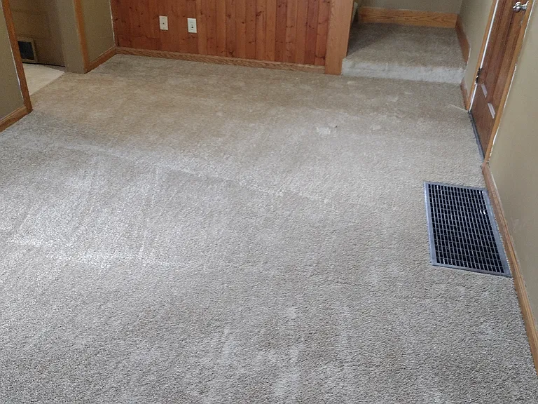 Family room view #1, repainted and carpet May 2026