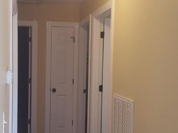 hallway to washer and dryer, second bed room, office (or thi